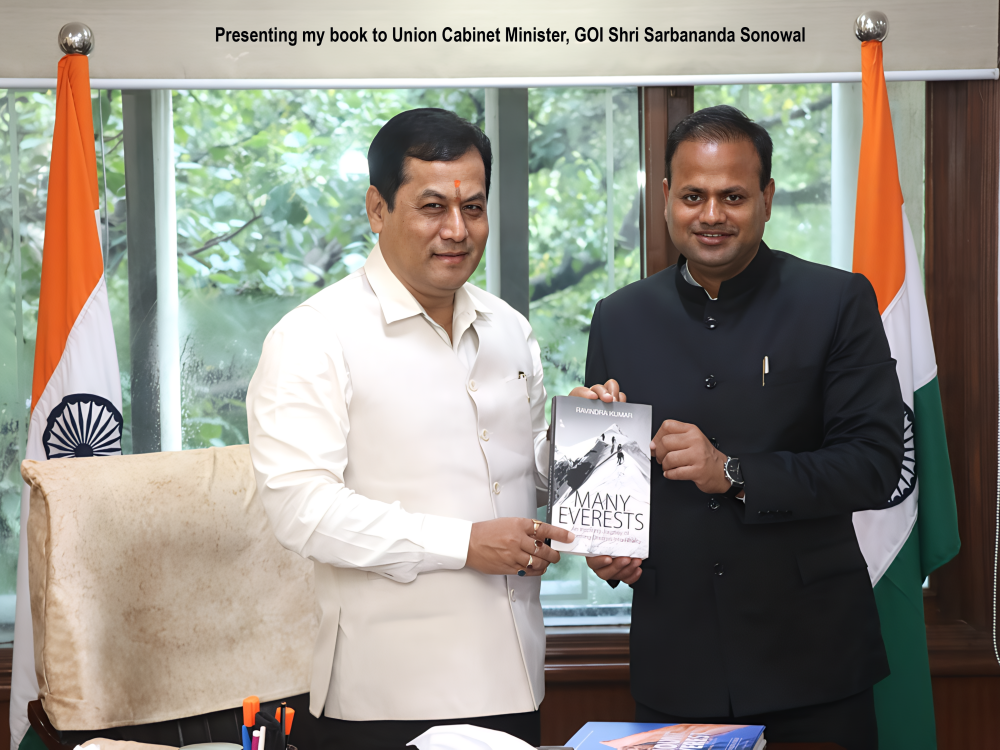 Presenting-my-book-to-Union-Cabinet-Minister-Shri-Sarbananda-Sonowal.png