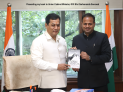Presenting-my-book-to-Union-Cabinet-Minister-Shri-Sarbananda-Sonowal.png